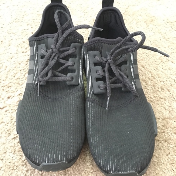 nmd triple black reflective